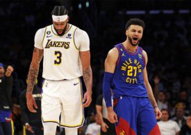 Der Basketballspieler Jamal Murray von den Denver Nuggets und der Basketballspieler Anthony Davis von den Los Angeles Lakers und stehen neben einander