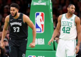 Karl-Anthony Towns von den Minnesota Timberwolves jubelt, Al Horford von den Boston Celtics schaut zerknirscht