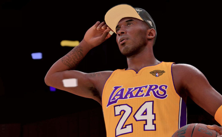Kobe Bryant im Lakers-Trikot mit Kappe